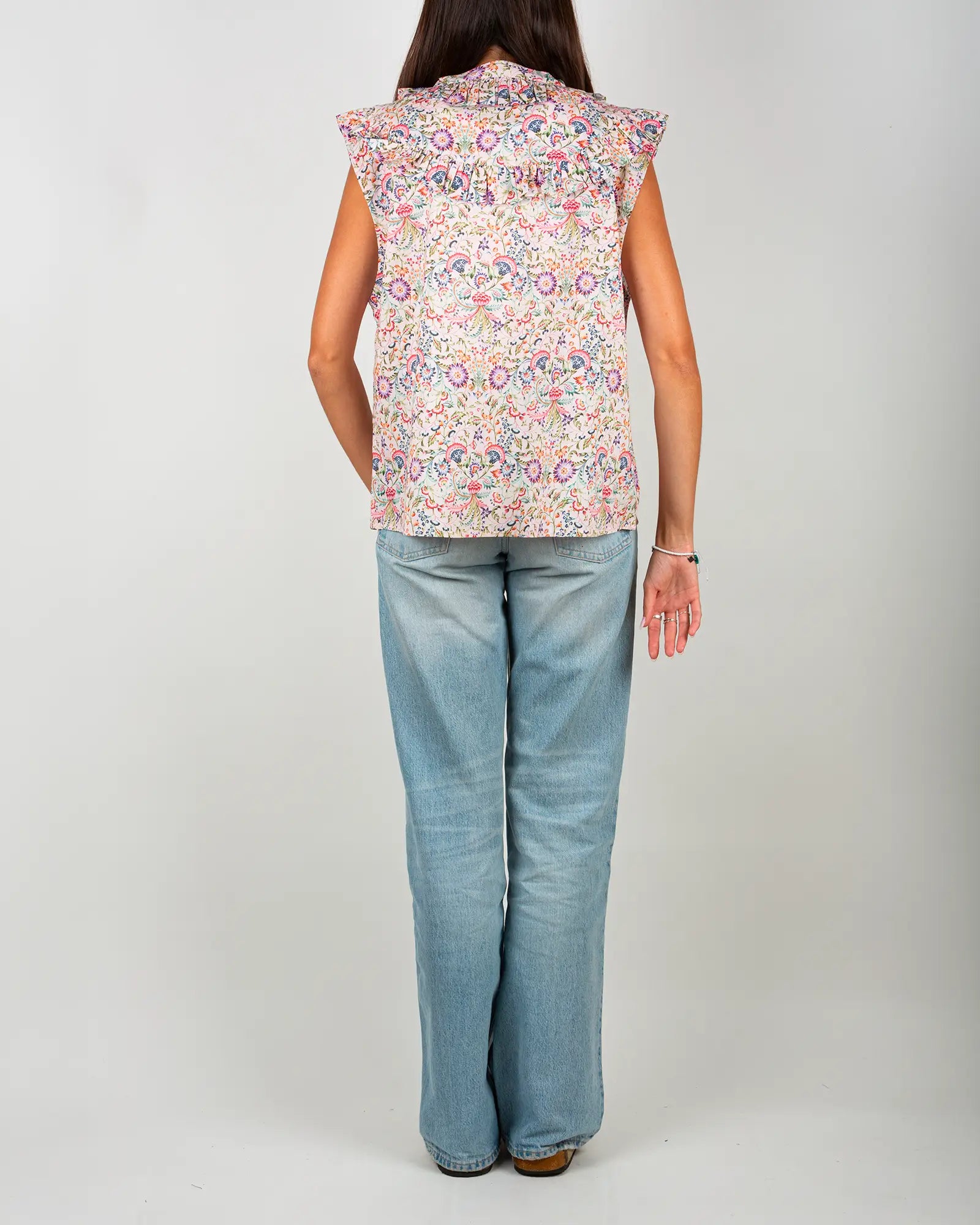 Blusa donna senza maniche con volant Febre