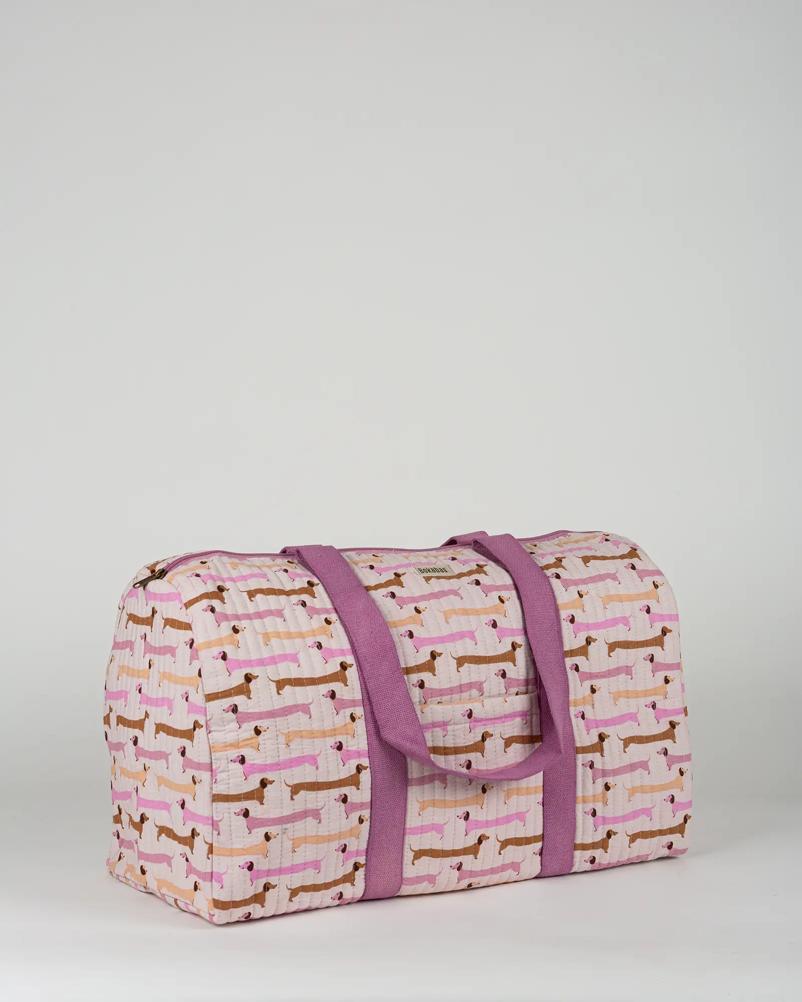 Sac week-end matelassé Bokabas, imprimé Saucisse chien teckel rose et violet, vue de face