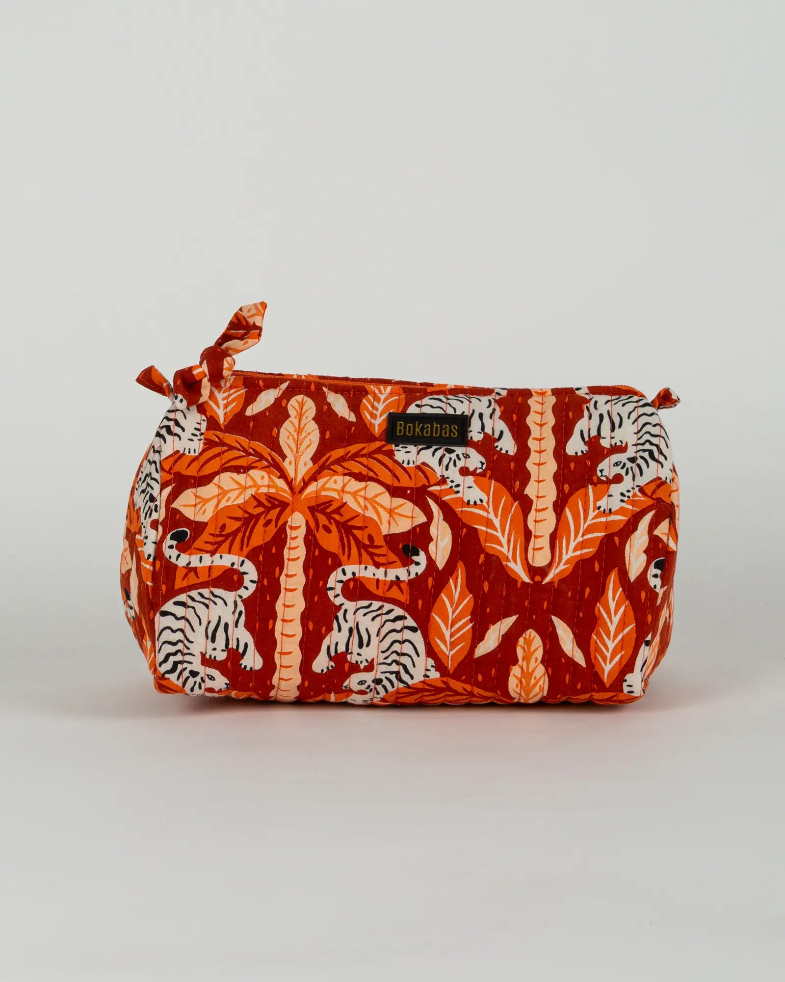 Trousse de toilette matelassée en coton Bokabas, imprimé Tropique palmier et guépard orange, vue de face