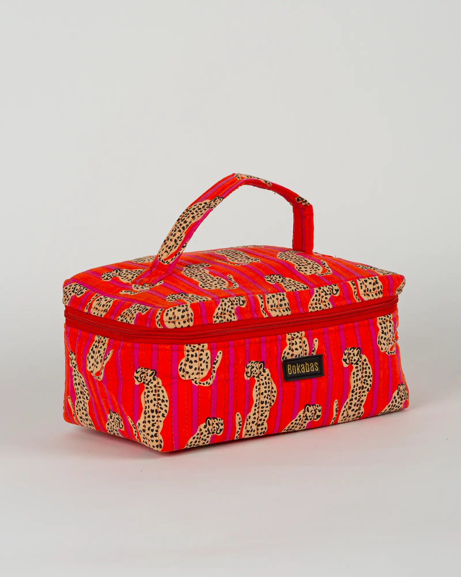Trousse vanity maquillage matelassée Bokabas, imprimé Guépard rayé orange et rose, vue de trois-quarts