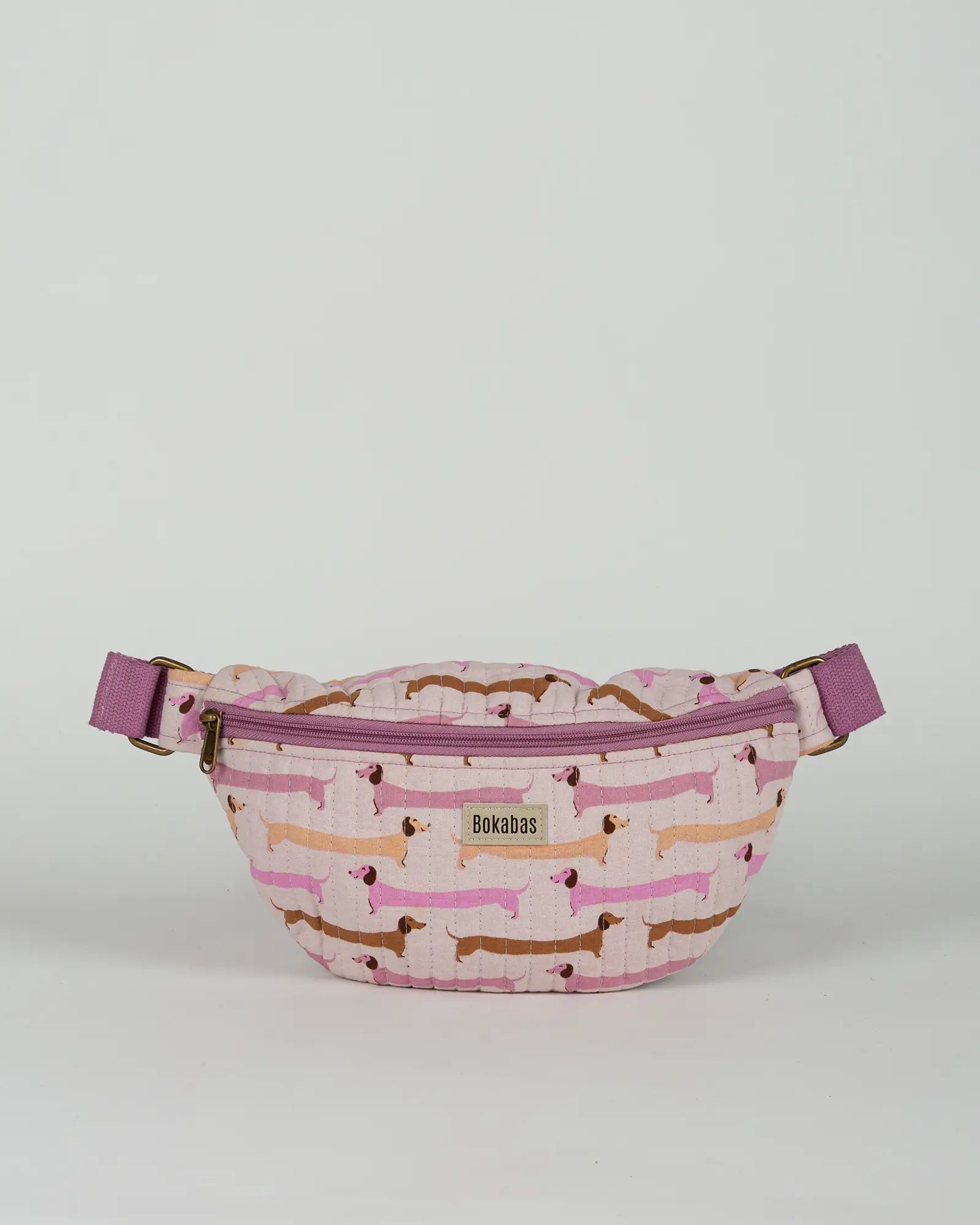 Sac banane matelassé Bokabas, imprimé Saucisse chien teckel rose et violet, vue de face