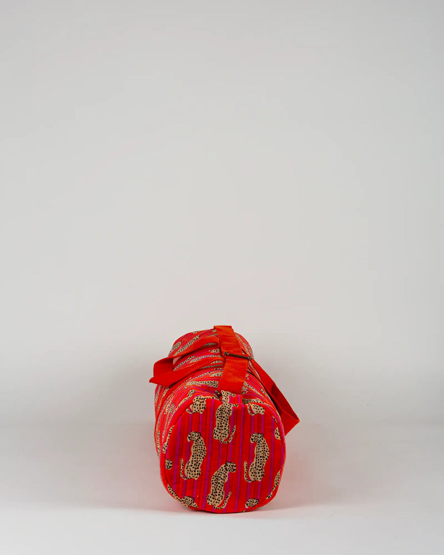 Sac de yoga en tissu matelassé Bokabas, imprimé Guépard rayé orange et rose, vue de profil