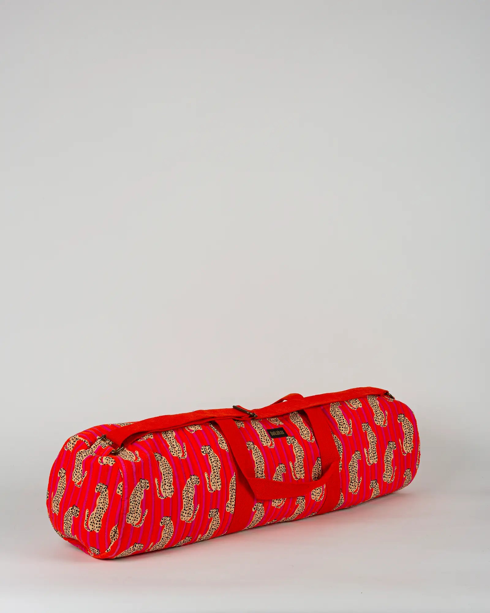 Sac de yoga en tissu matelassé Bokabas, imprimé Guépard rayé orange et rose, vue de trois-quarts