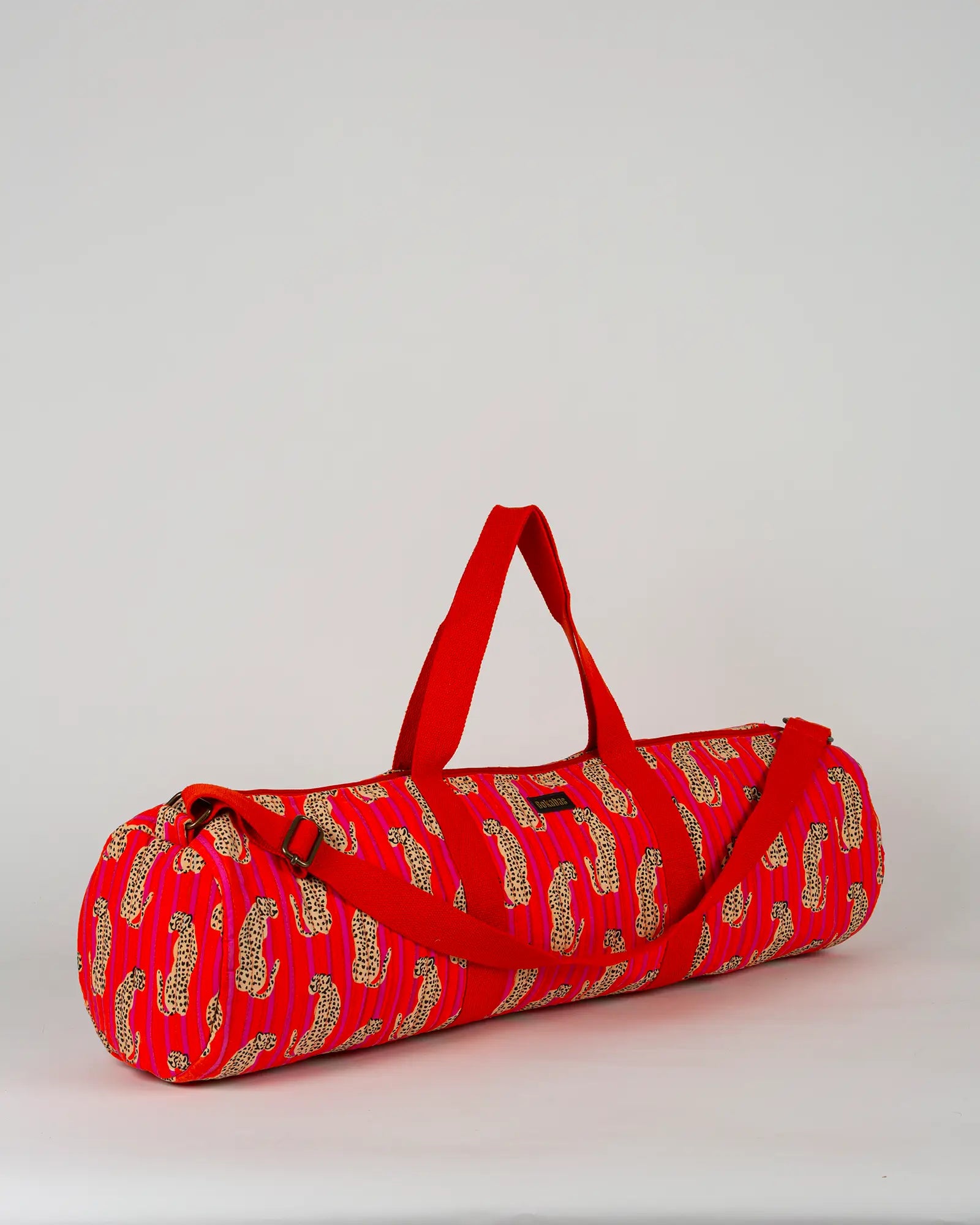 Sac de yoga en tissu matelassé Bokabas, imprimé Guépard rayé orange et rose, vue de trois-quarts
