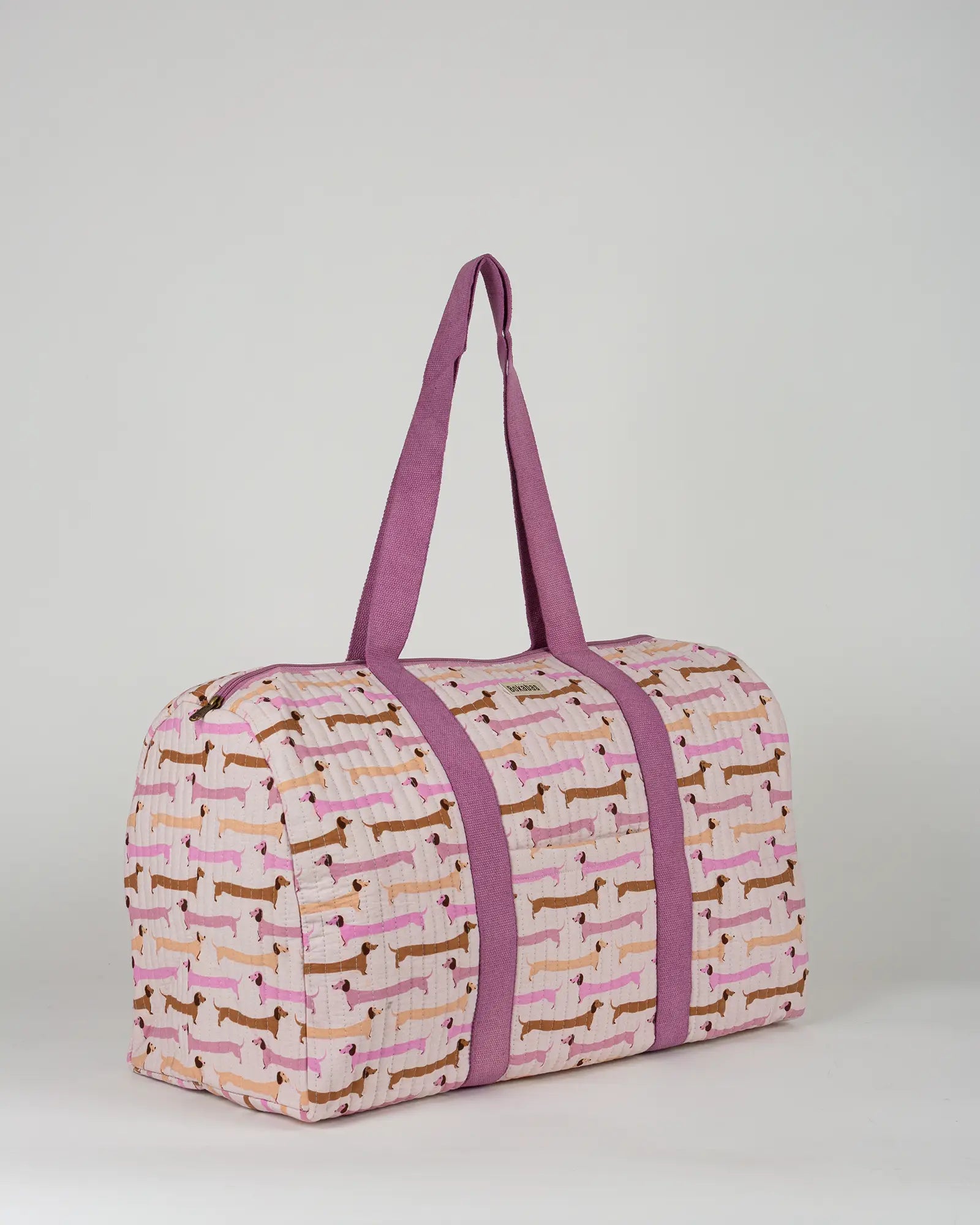 Sac week-end matelassé Bokabas, imprimé Saucisse chien teckel rose et violet, vue de face
