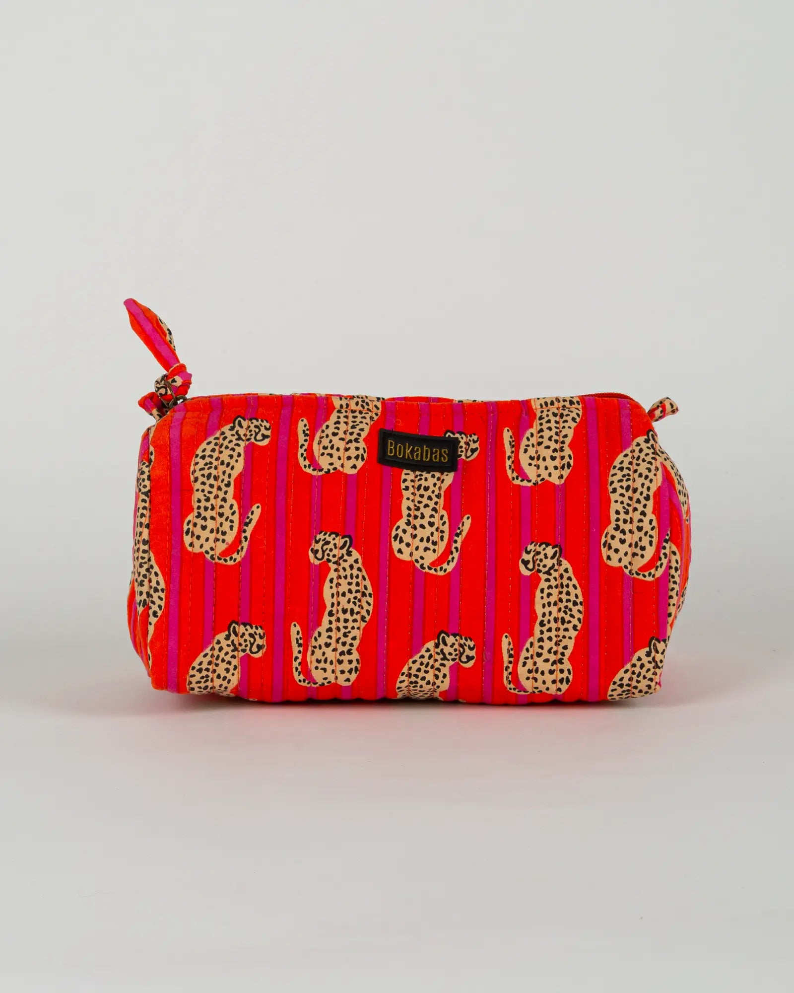 Trousse de toilette matelassée en coton Bokabas, imprimé Guépard rayé orange et rose, vue de face