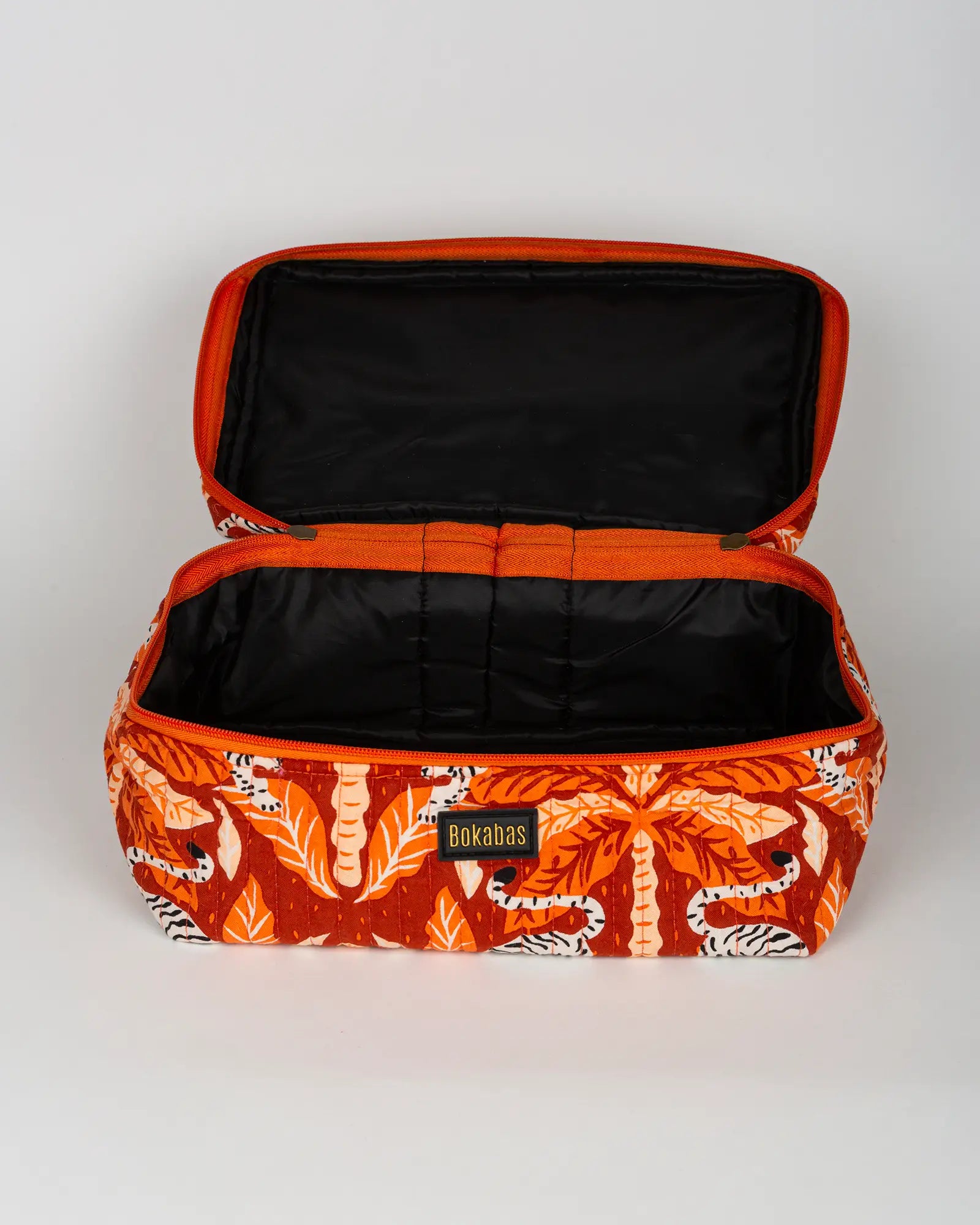 Trousse vanity maquillage matelassée Bokabas, imprimé Tropique palmier et guépard orange, vue de l'intérieur